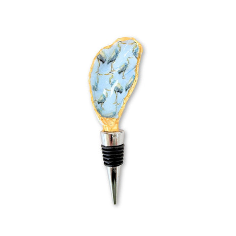 Decoupage oyster shell wine stopper with a blue heron on a stainless base by Melissa Fouts