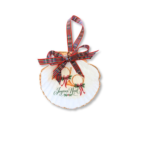 Decoupage scallop shell ornament with French horns and Joyeux Noël script, gilded edge, and red plaid ribbon by Melissa Fouts.