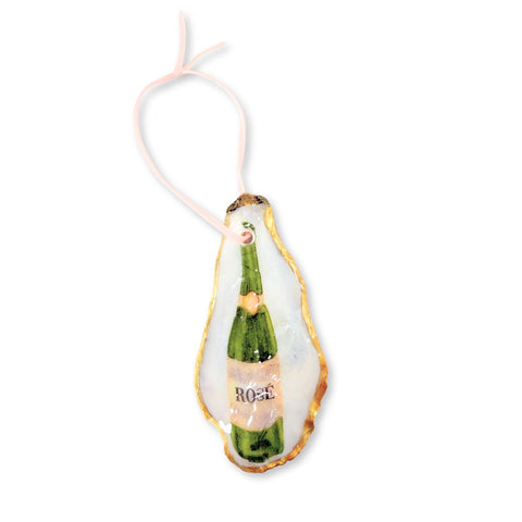 Decoupage oyster shell ornament with a rose wine bottle on a blush pink ribbon by Melissa Fouts