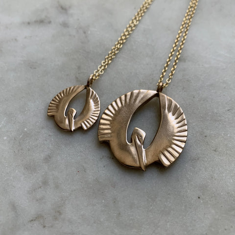 Pelican Rising Pendant Necklaces